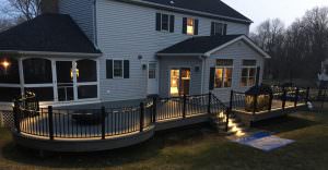 deck-lighting2 white house with wood deck